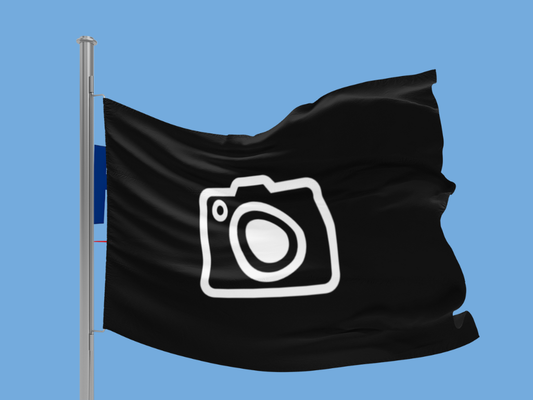 Black flag with a white camera symbol on a blue background